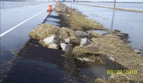 The damage from flooding was less in 2010 after engineers added rocks and vegetation to the side of Highway 9, near Ada.