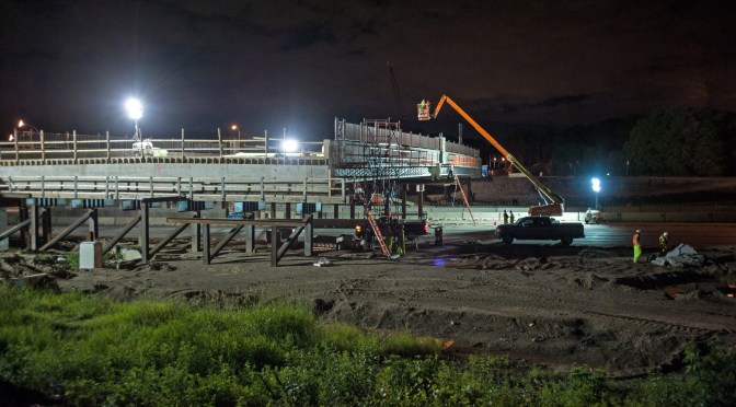 Watch MnDOT slide a 3.5-million pound bridge into place