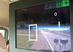 The driver assist system displays a white box on the screen when an obstacle, or in this case a mailbox, is located. If the object appears in the lane, such as a car stuck in a snow drift, the box turns red and gets bigger as the snowplow gets closer to the object. (Photo courtesy of MnDOT District 7)