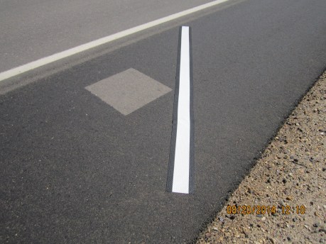 Reflective marking tape on road shoulder