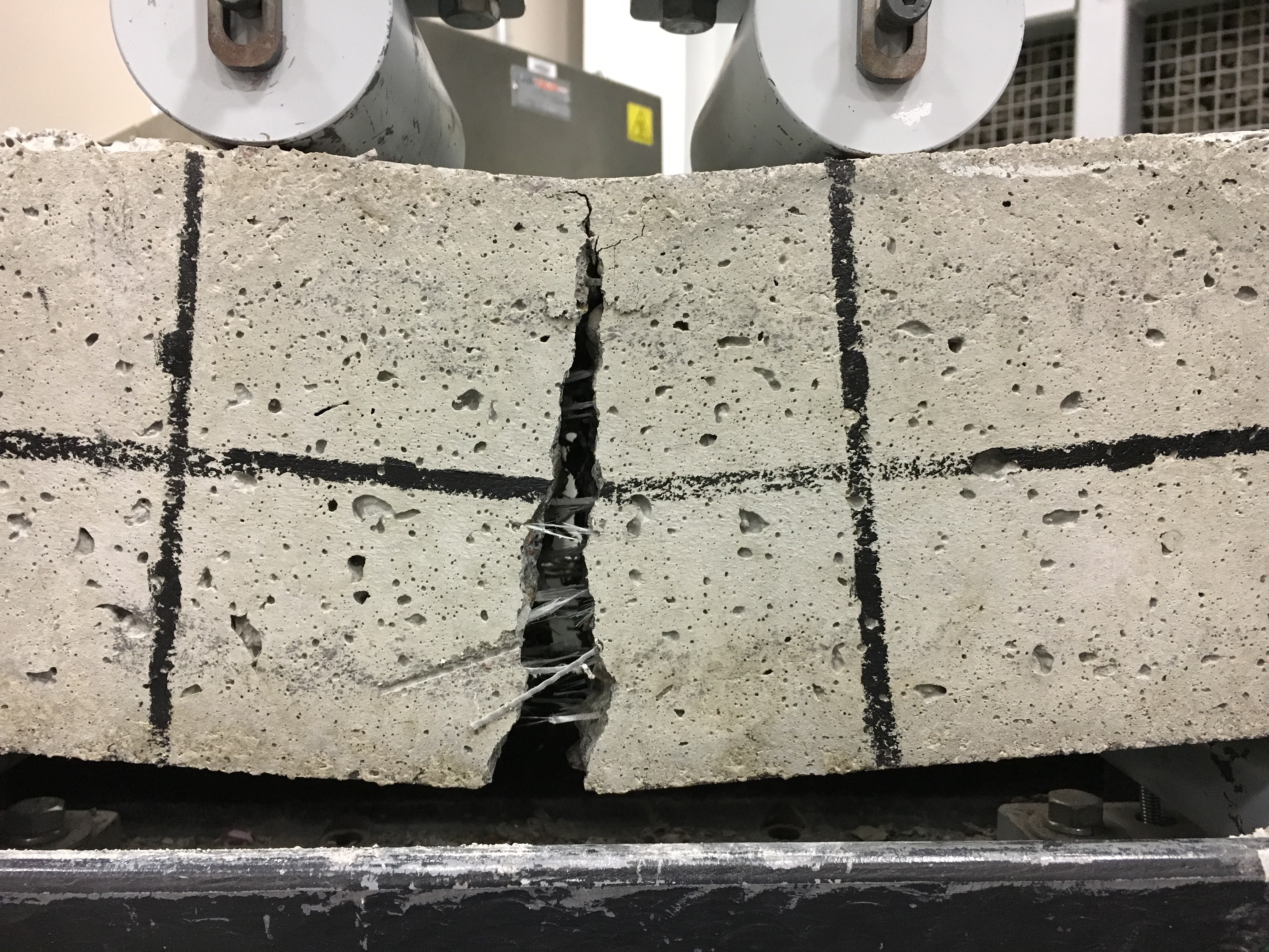 cracked concrete beams with fiber reinforcement