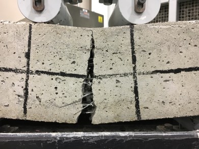 cracked concrete beams with fiber reinforcement