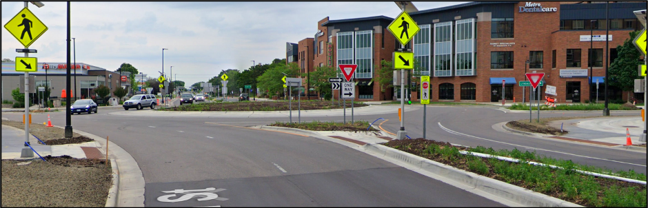 New intersection at 66th Street and Lyndale Avenue South features a roundabout and pedestrian crossing signs that improve crosswalk visibility.