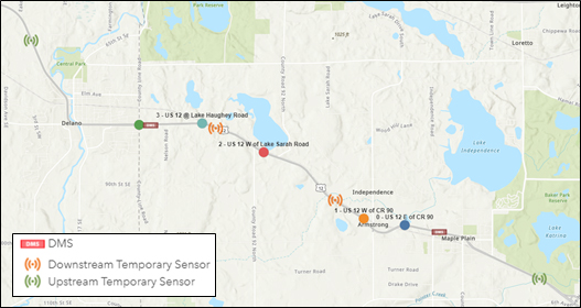 A map of a portion of U.S. Highway 12 showing (from west to east) an upstream traffic sensor, Delano, a DMS, two downstream traffic sensors, a DMS, Maple Plain and an upstream traffic sensor.