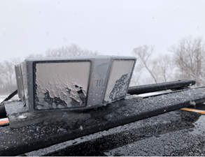 An image showing a thick layer of ice on the lidar lens.
